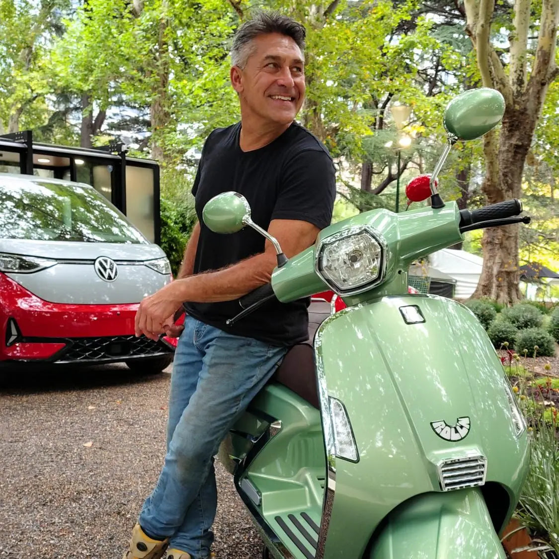 Jamie Durie on Green electric moped motorbike scooter at Melbourne international flower show 2026